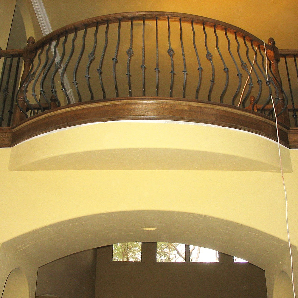 balcony rim for a loft over a barrel vault in a man cave