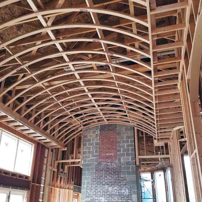 Barrel vault ceiling being framed below the roof line