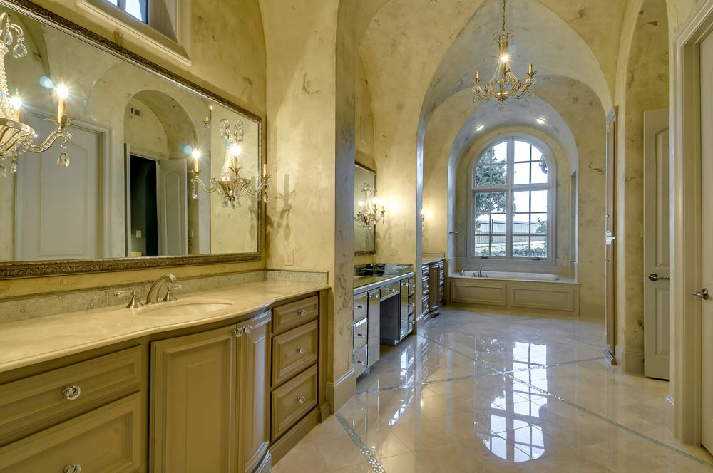 French Country Bathroom with Groin Vaults and Arched Windows