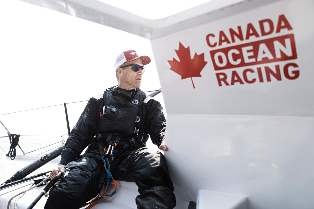 Scott Sailing with Canada Ocean Racing logo in background