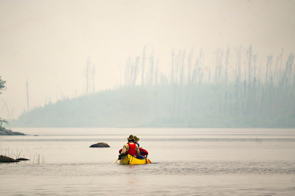 David and Leah paddling through smokey conditions