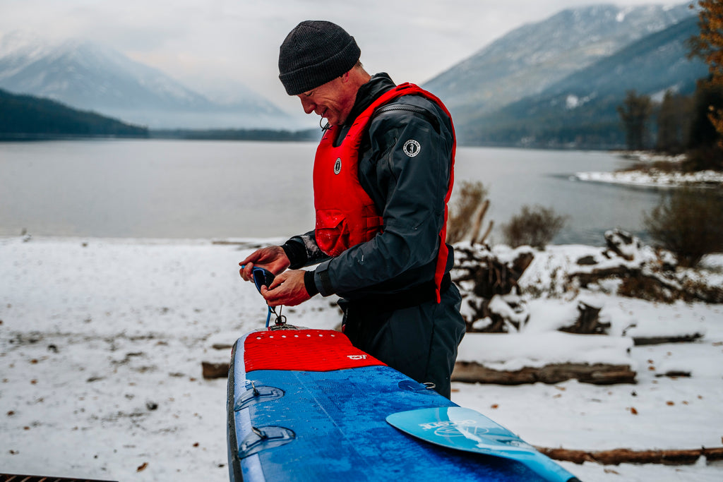 man adjusting sup