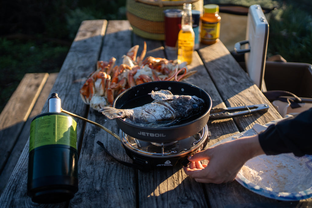 Preparing crab and fish