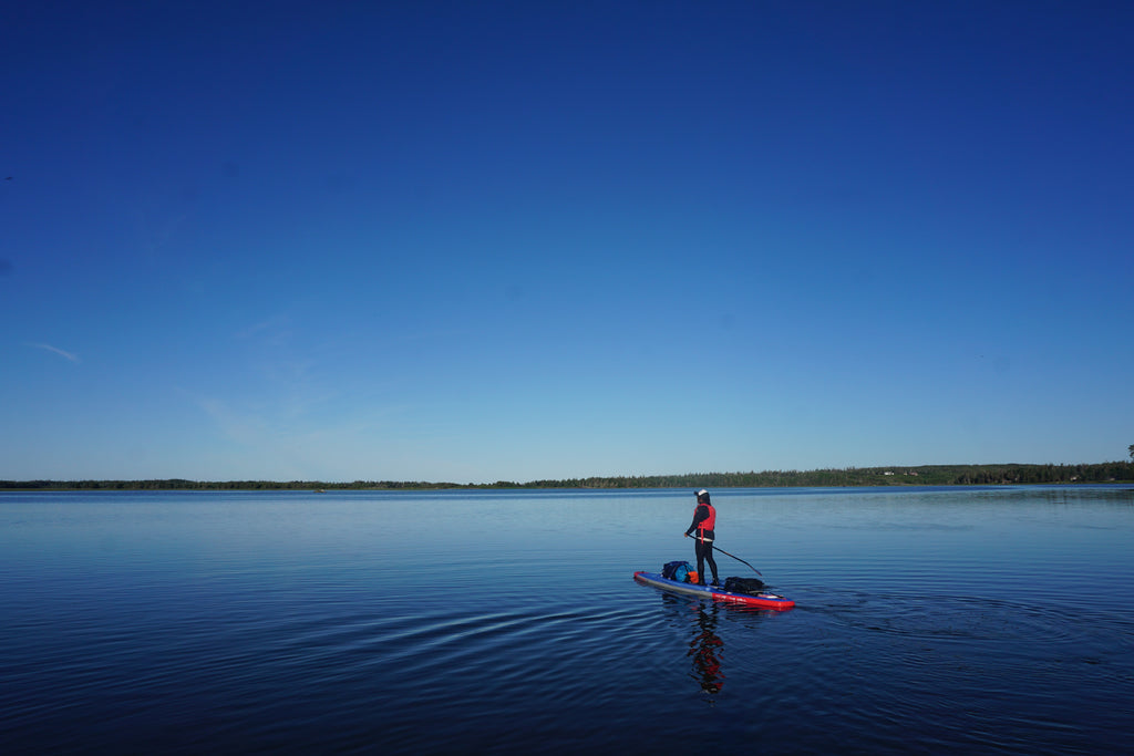 Mariele paddling solo on flat water