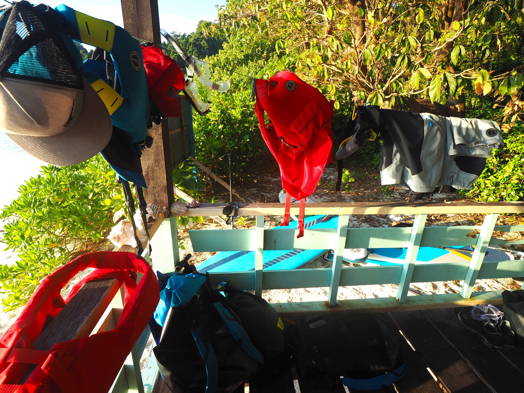 drying clothes and a life jacket on a line