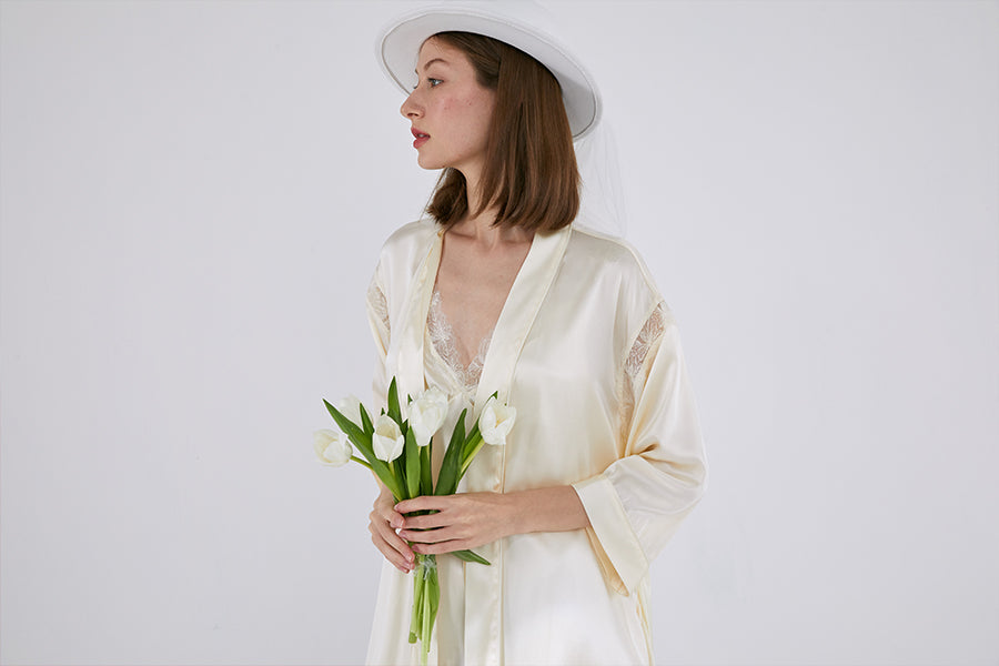 lady in silk robe with a white rose