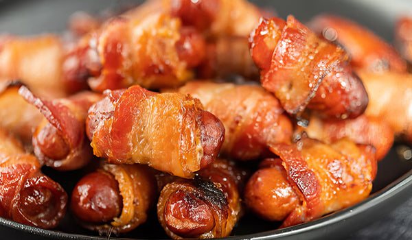 Bacon wrapped mini hot dogs