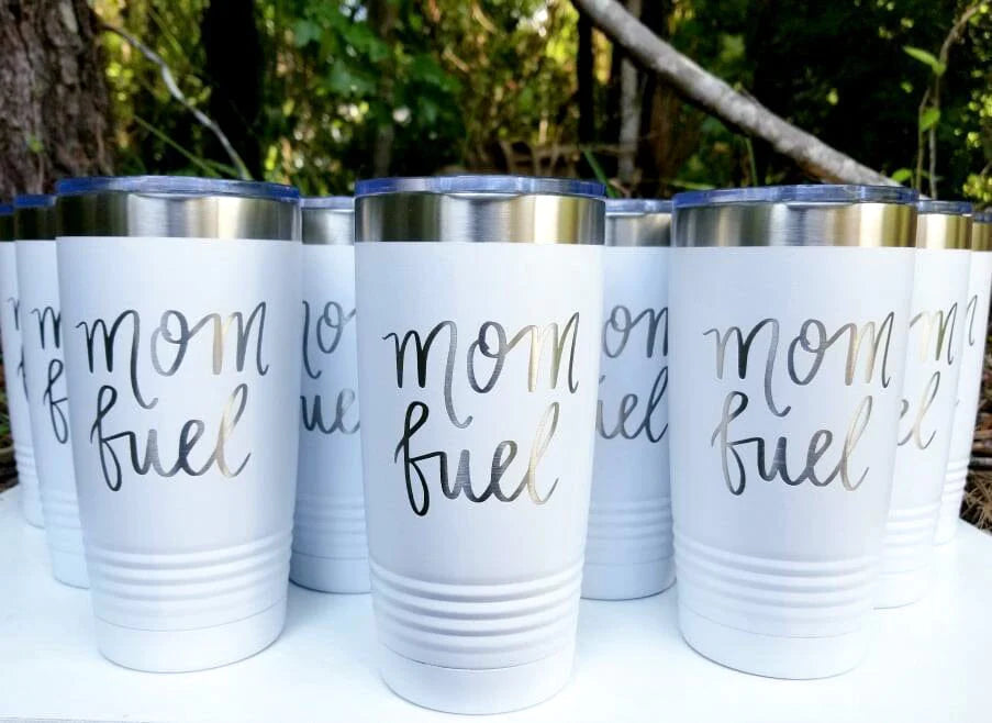 Mom fuel tumblers on a table