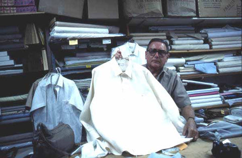 Ramon Puig showing a long white sleave guayabera shirt