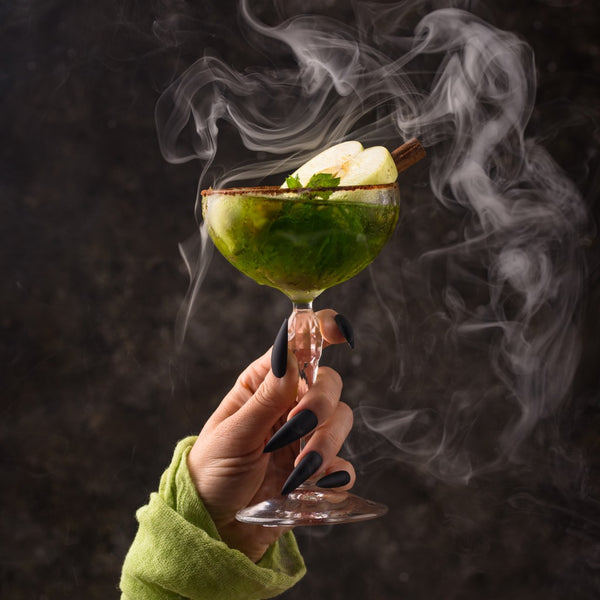 A sppoky green halloween cocktail.