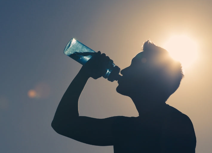 Athlete drinking water