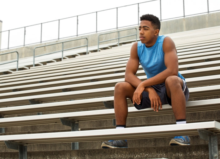 Athlete mentally preparing for discus throw