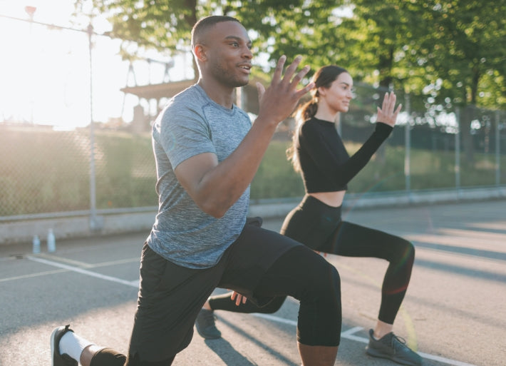 Athletic Couple exercising outdoors