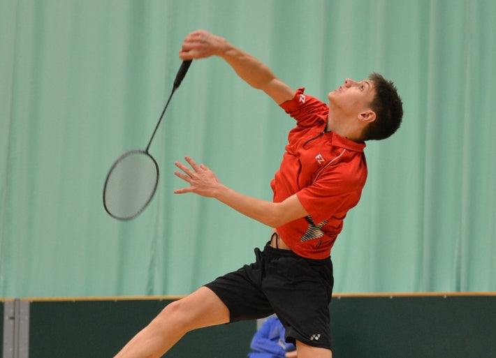 Charlie Wakefield playing badminton