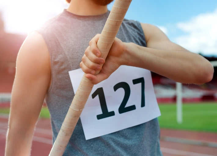 Male Athlete Holding Vaulting Pole