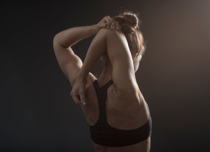 Female athlete stretching