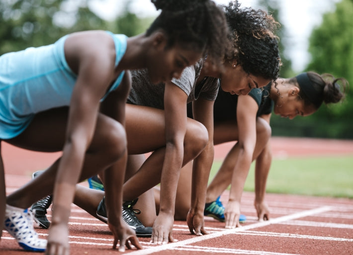 Female athletes at starting line