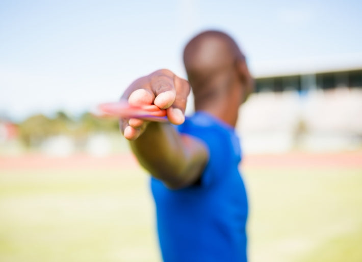 Male Athlete Standing with Javelin