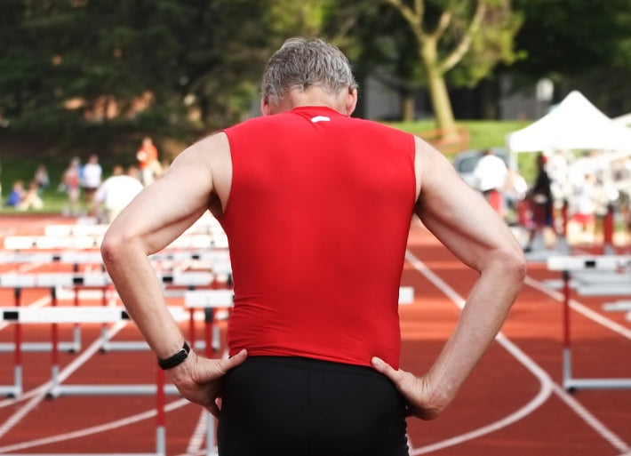 Masters athlete preparing to race