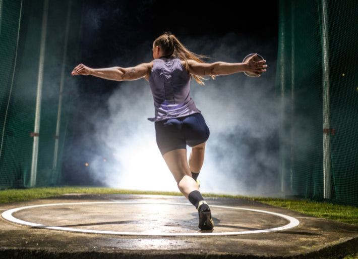 Senior discus thrower competing