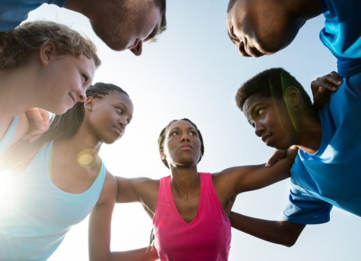 Track Coach Motivating Young Sprint Athletes