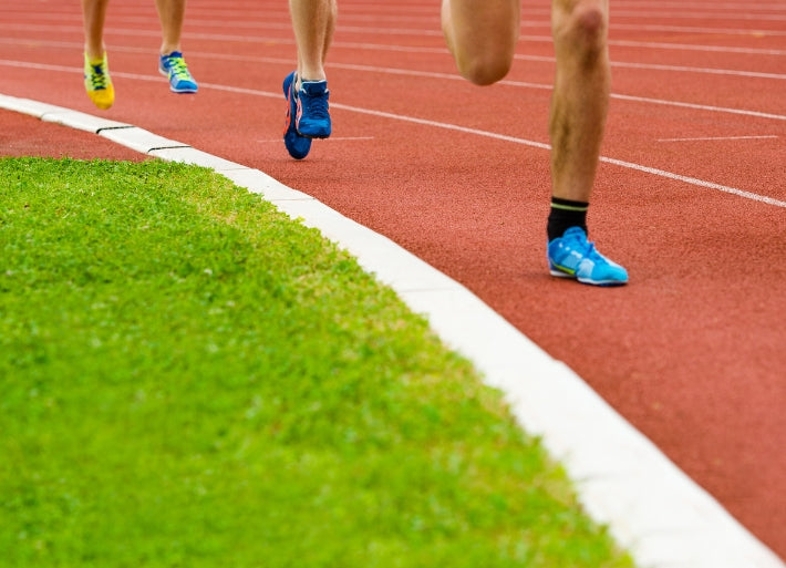 Group of Athletes Running 800m Race