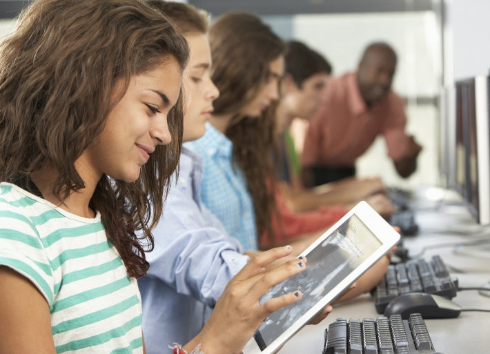 Students Using Digital Tablets in Class