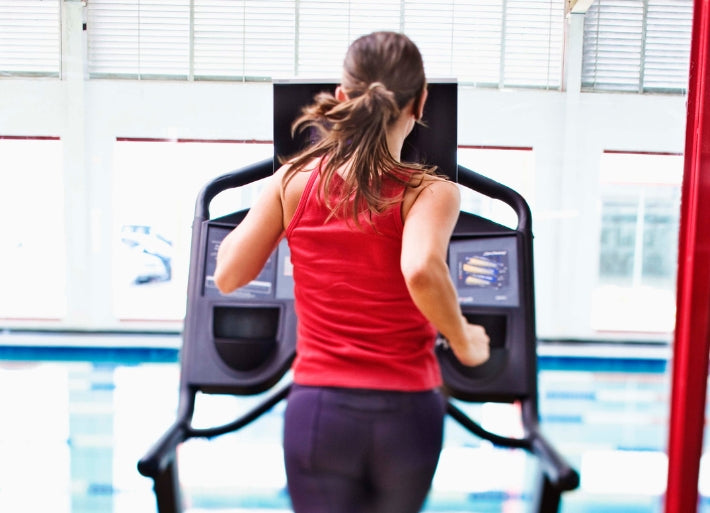 Young athlete running on treadmill