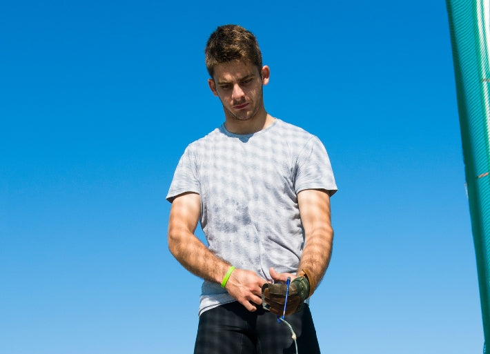 Young Male Athlete Getting Ready for Hammer Throw