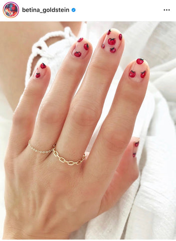 Tomato nails by @betina_goldstein