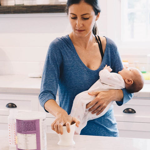 Use the bokee to simplify bottle feedings to prep bottles with one hand.