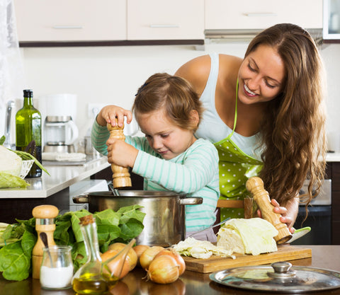 Involving children in the cooking process can help them be mindful in their eating.