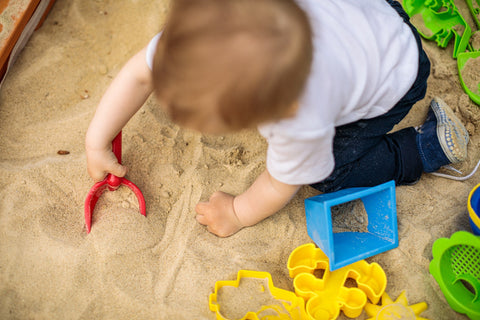 Sand and water play are excellent outdoor activities.