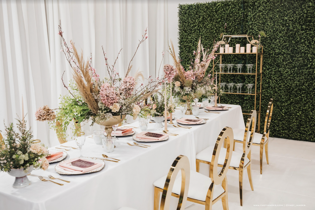 elaborate table setting with floral arrangements