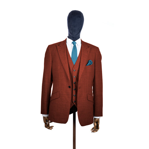 Airforce Blue knitted tie and pocket square with rust suit on a mannequin-BroniandBo