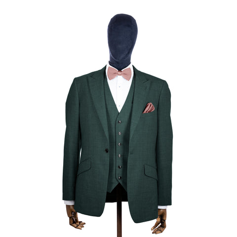 Antique Rose knitted bow tie and pocket square with green suit on a mannequin-BroniandBo