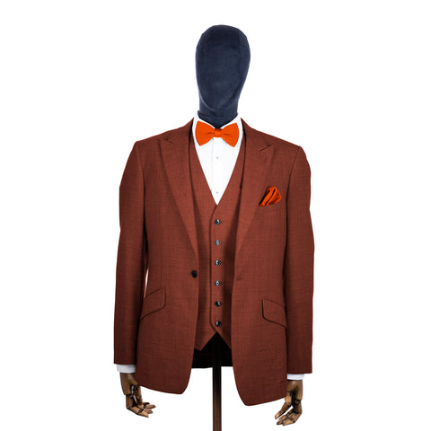 Burnt Orange knitted bow tie and pocket square with rust suit on a mannequin-BroniandBo