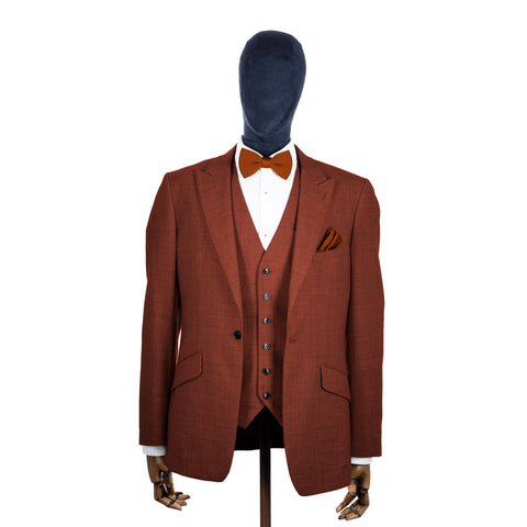 Copper knitted bow tie and pocket square with rust suit on a mannequin-BroniandBo