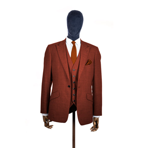 Copper knitted tie and pocket square with rust suit on a mannequin-BroniandBo