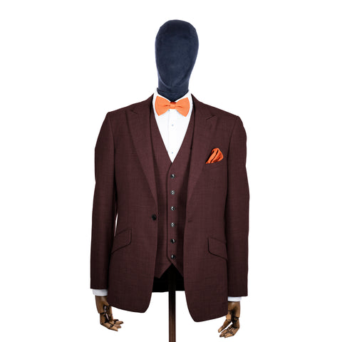 Coral Fusion knitted bow tie and pocket square with brown suit on a mannequin-BroniandBo