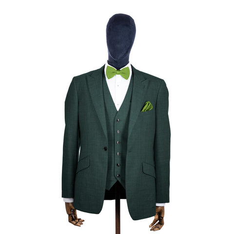 Emeral Green knitted bow tie and pocket square with green suit on a mannequin-BroniandBo