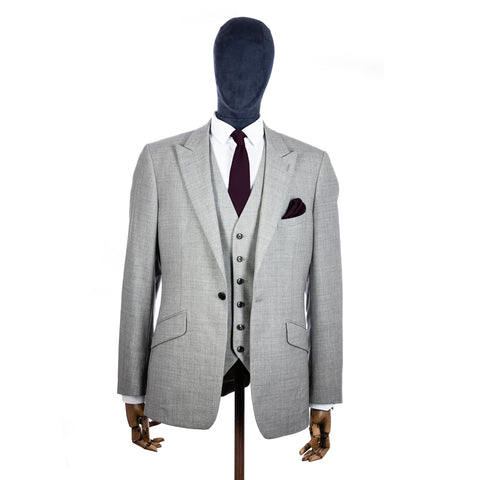 English Violet Knitted tie and pocket square with grey suit on a mannequin - centre