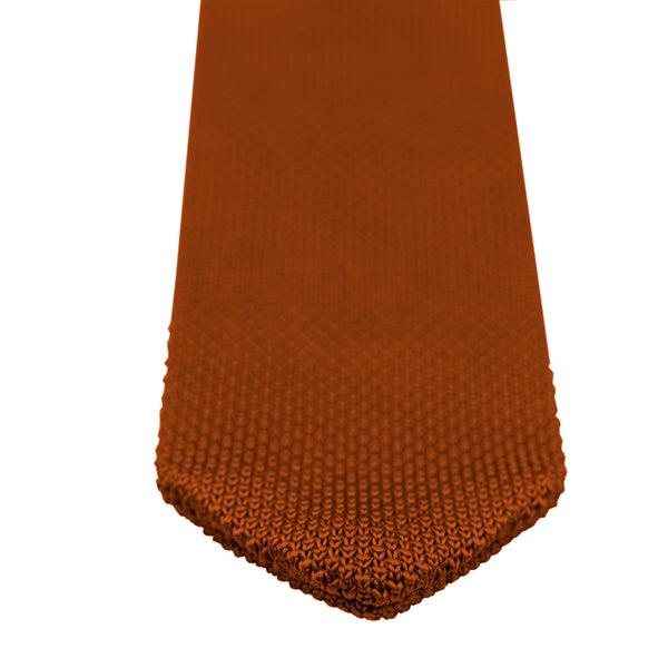 Knitted tie 1x1 weave Copper Knitted tie pointed end close up