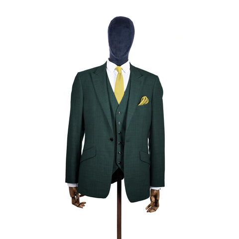 Mellow Yellow knitted tie and pocket square with green suit on a mannequin-BroniandBo