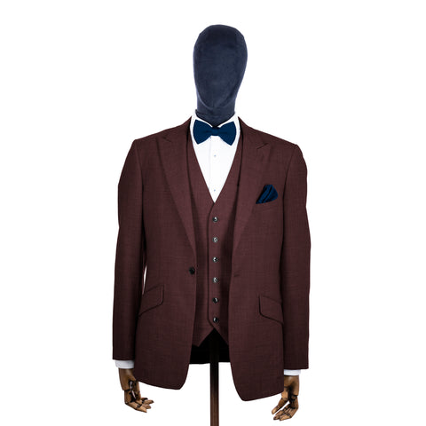Midnight Blue knitted bow tie and pocket square with brown suit on a mannequin-BroniandBo