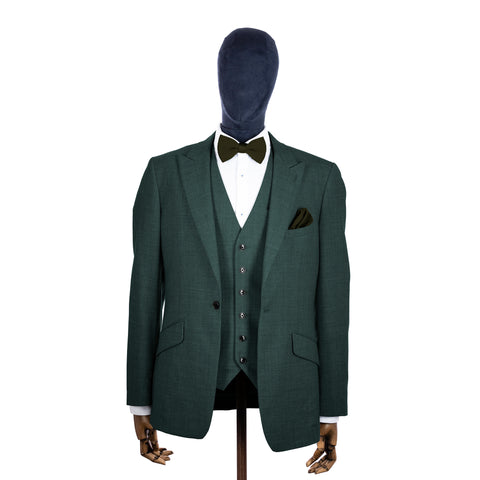 Moss Green knitted bow tie and pocket square with green suit on a mannequin-BroniandBo