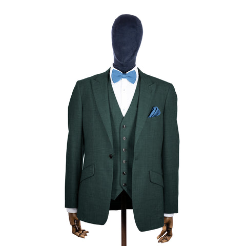 Pastel Blue knitted bow tie and pocket square with green suit on a mannequin-BroniandBo