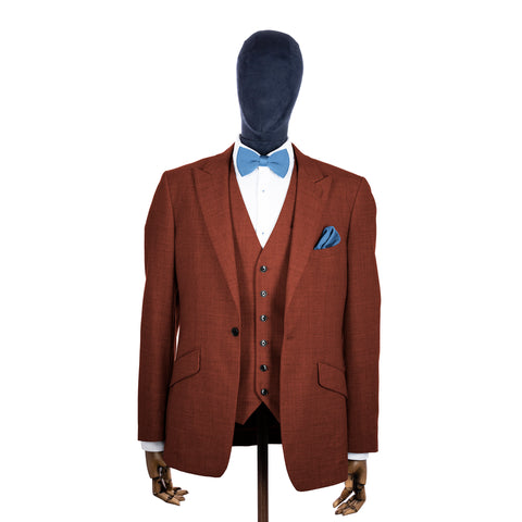 Pastel Blue knitted bow tie and pocket square with rust suit on a mannequin-BroniandBo