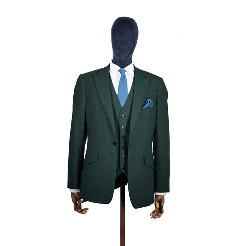 Pastel Blue knitted tie and pocket square with green suit on a mannequin-BroniandBo