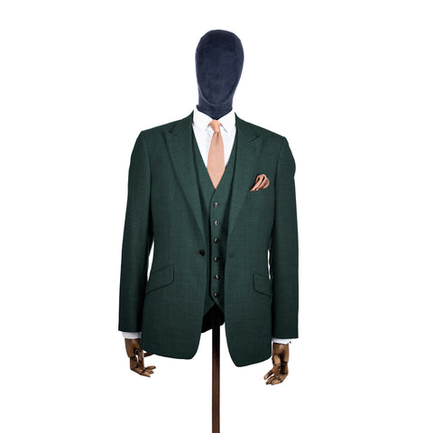 Rose Quartz knitted tie and pocket square with green suit on a mannequin-BroniandBo